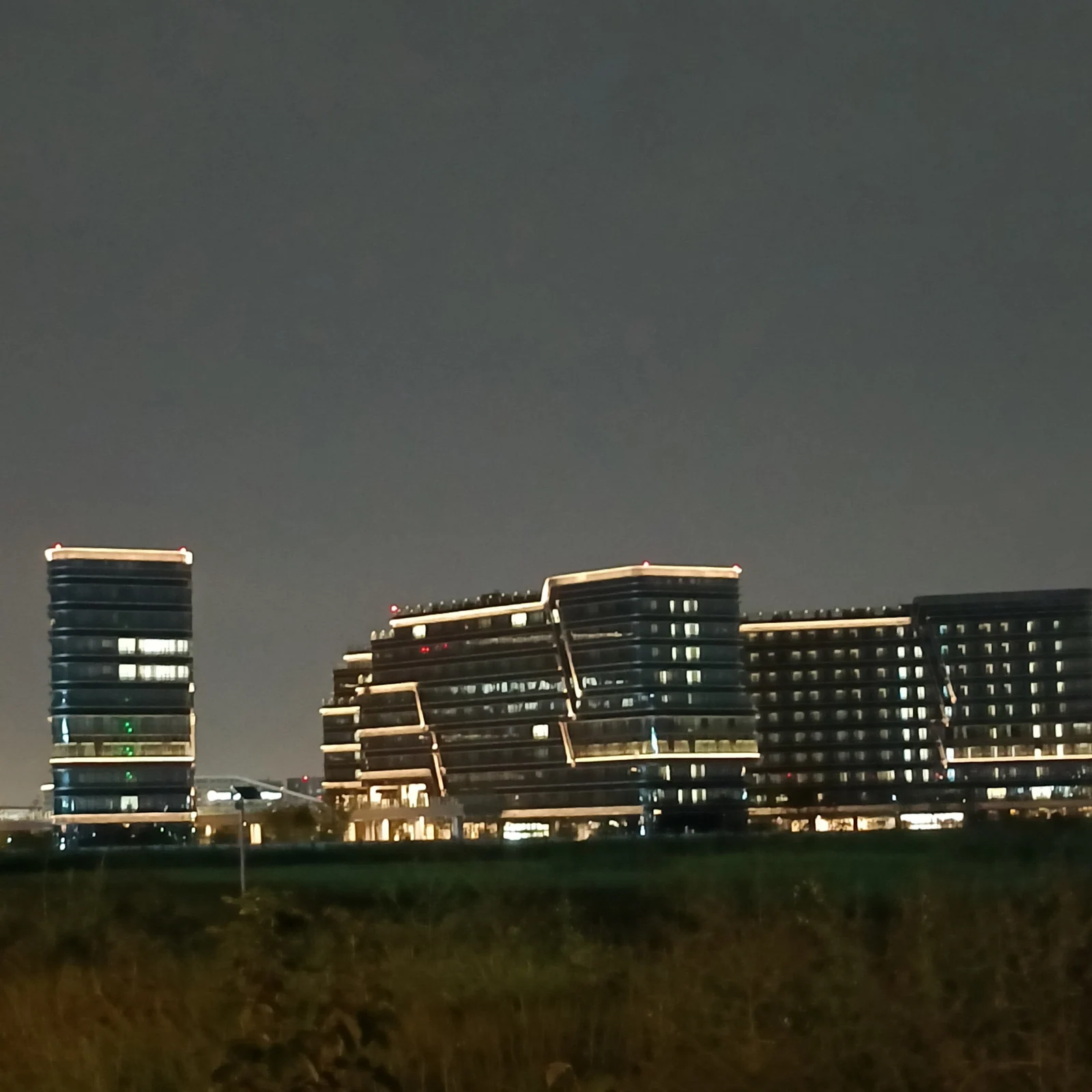Custom Lighting Manufacturer Facade & Floodlighting Solutions for Shenzhen Airport T3 Public Housing project view