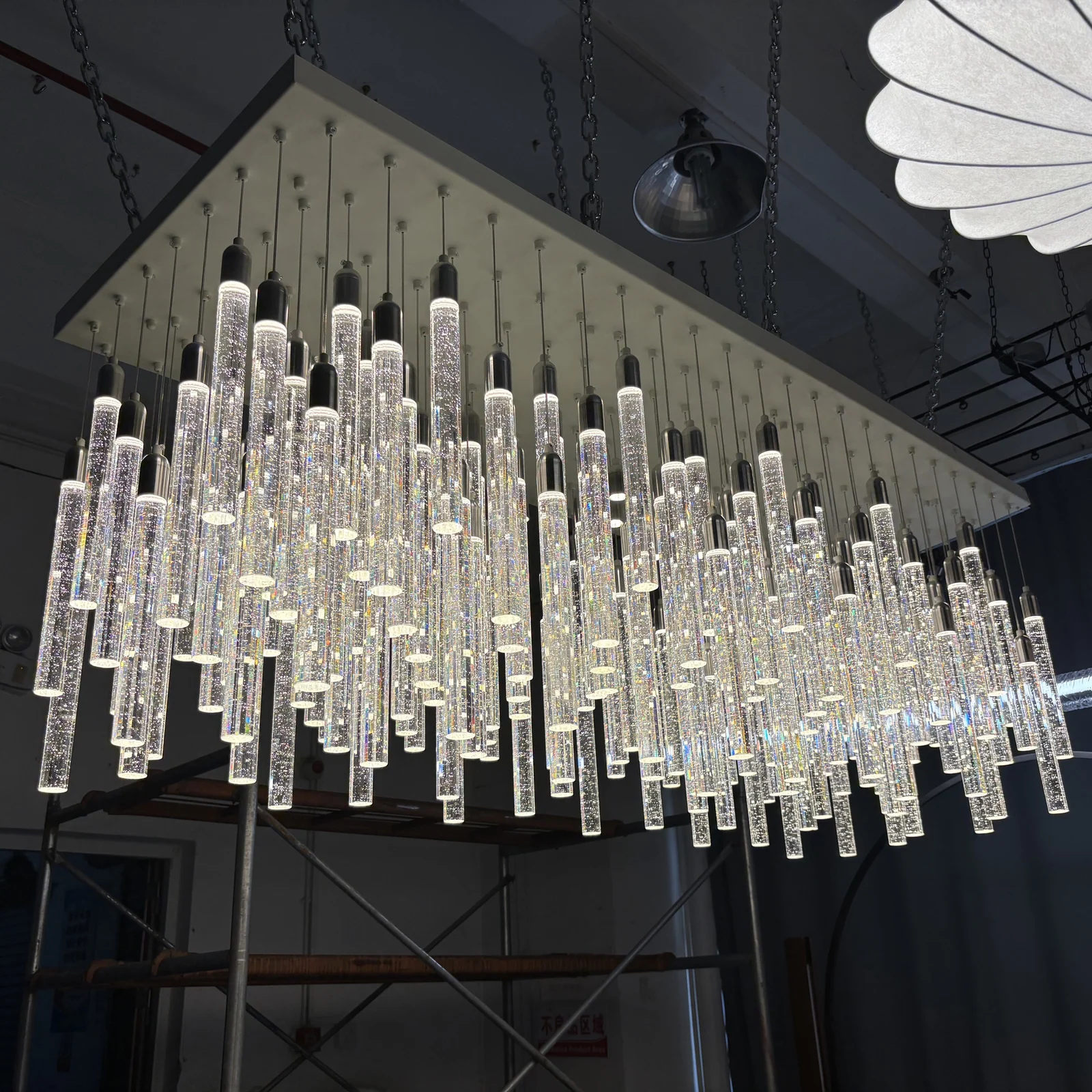 Custom Crystal Bubble Tube Stairwell Chandelier for Luxury Penthouse Bespoke High-Ceiling Fixtures project view