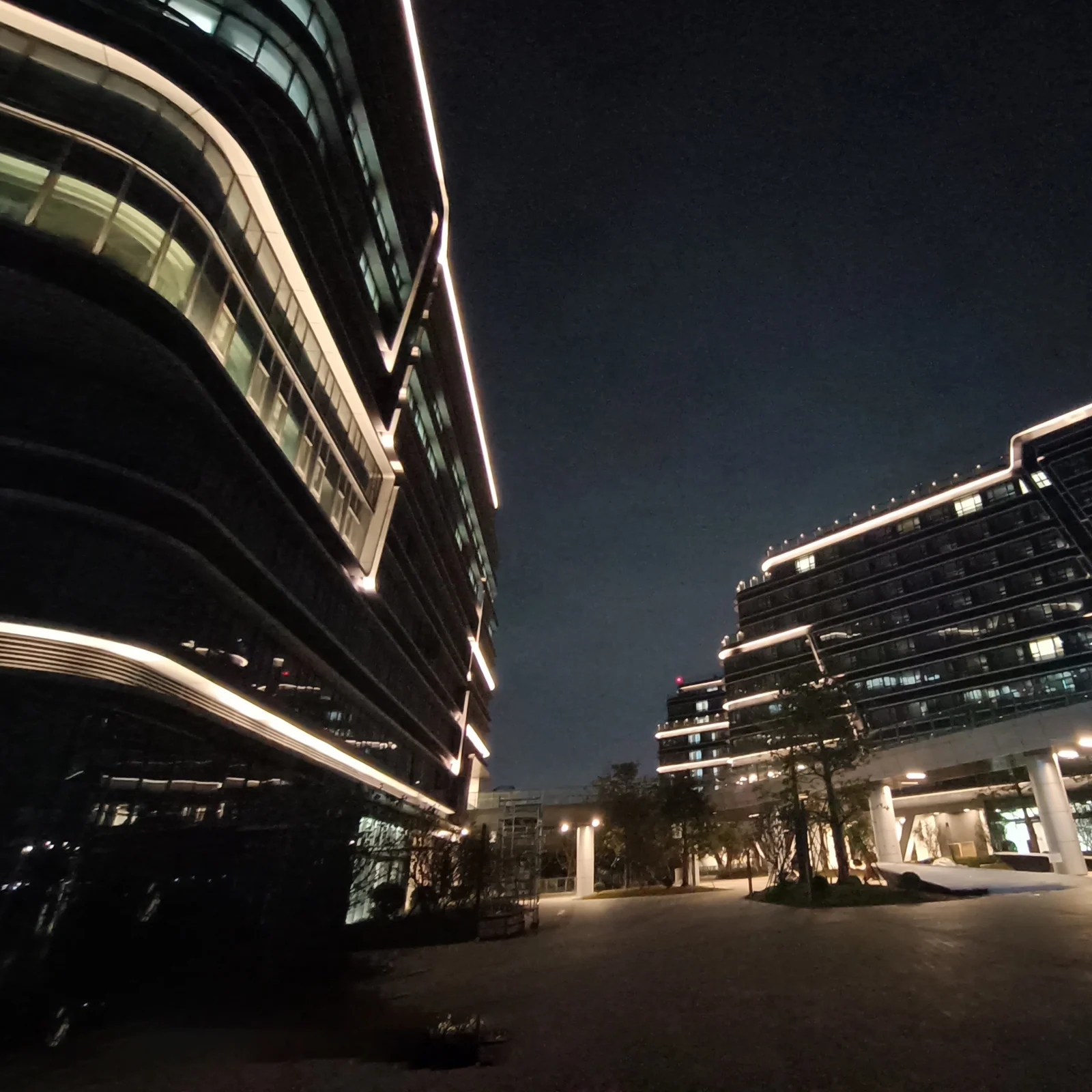 Custom Lighting Manufacturer Facade & Floodlighting Solutions for Shenzhen Airport T3 Public Housing project view