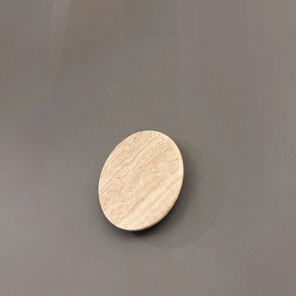 Minimalist Travertine Disc Wall Sconce detail