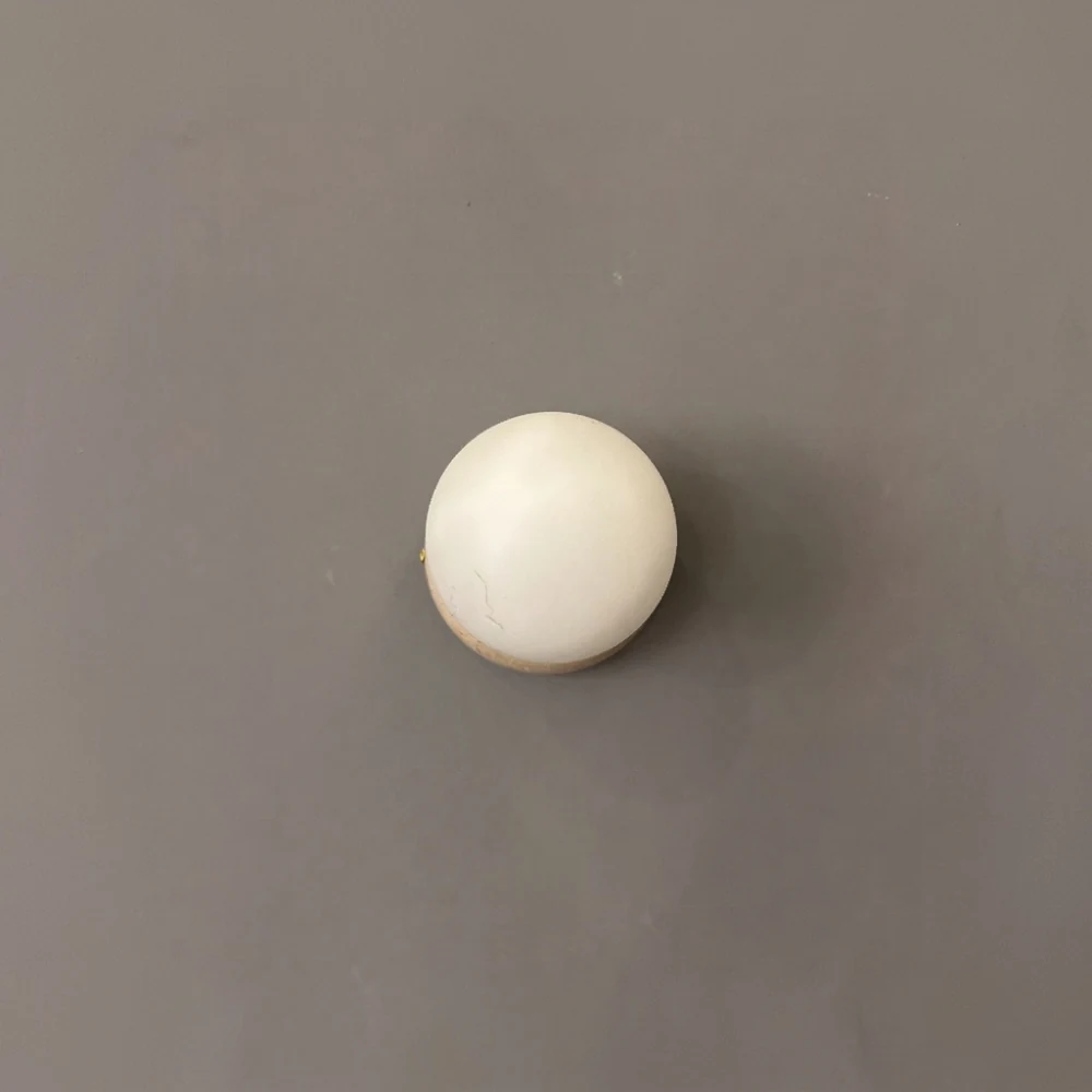Travertine Base Glass Globe Wall Sconce detail