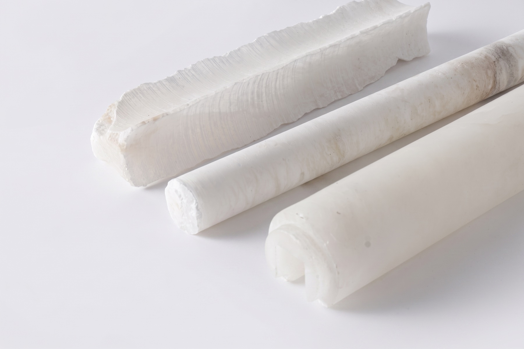 Natural alabaster material showing translucent veining for pendant lighting